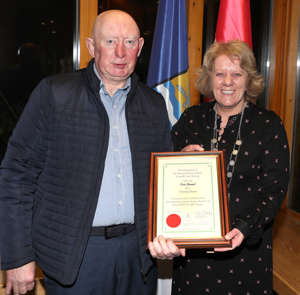 Cathaoirleach Paula Butterly, presents the award to Tommy Burns thumbnail
