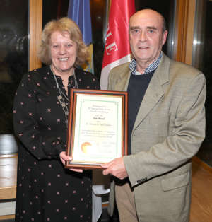 Cathaoirleach Paula Butterly, presents the award to St. Vincent de Paul in Dunleer thumbnail